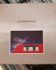 Jan Garbarek Group - Photo With Blue Sky, White Cloud, Wires, Windows And A Red Roof Jan Garbarek Group - Photo With Blue Sky, White Cloud, Wires, Windows And A Red Roof